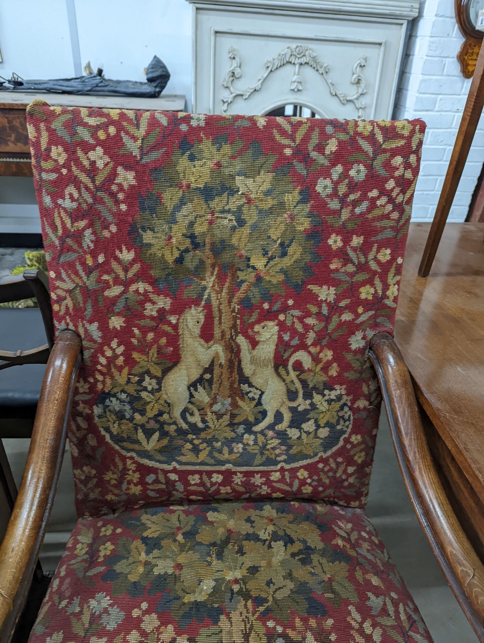 A 19th century walnut tapestry armchair, width 65cm, depth 53cm, height 110cm